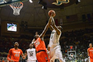 Guard Jawanza Poland attempts field goal in USF 55-44 loss to Syracuse Orange on Sunday. 