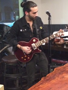 Scott Perez plays the first Gibson Les Paul American Rosewood Guitar at The Grind  Coffee Bar and Café.