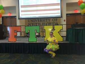Teri Deardorff,  the chair of fundraising for Dance Marathon, poses by the lights at Dance Marathon. The lights stand for “For the Kids,” which refers to Dance Marathon’s mission to raise money for children’s hospitals across the country. 