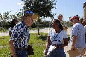 Al Felman, a member of Senior Citizens for Hillary Clinton, stood for hours out in the hot sun to ask attendees to vote. “I think Donald Trump is a phony,” Felman said. Felman dedicates more than 30 hours a week to talking to young people about voting.