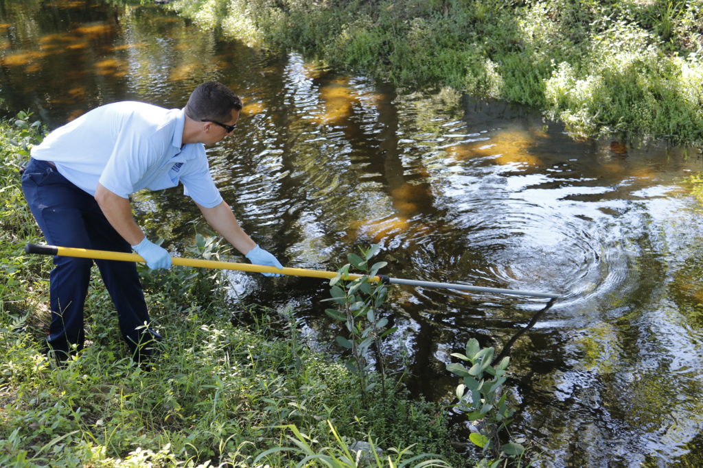 Samples Collected: Zach Gagnon works for the environmental compliance division of the water department for St. Petersburg. These past few weeks, Gagnon has been collecting samples of bodies of water around the city to test for bacteria and high levels of nutrients. Here, Gagnon samples a canal connected to Clam Bayou, just outside of Gulfport.