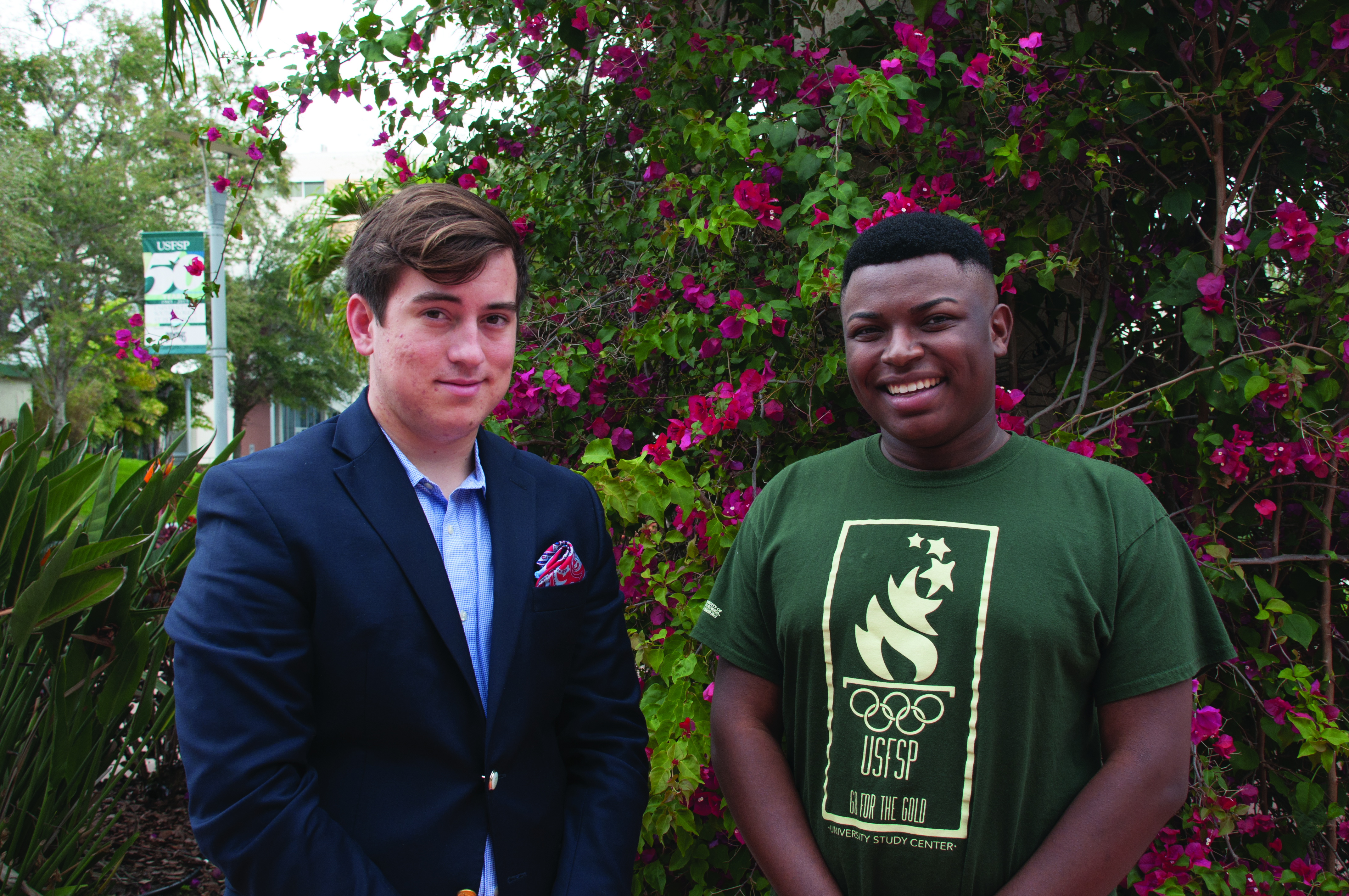 Highest Paid: David Thompson (right), student body president, poses with Sam Goetz, the vice president. They are the highest paid members of SG.